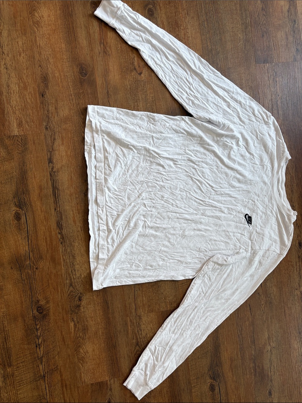 Nike White Long Sleeve Women's Tee with Small Black Swoosh